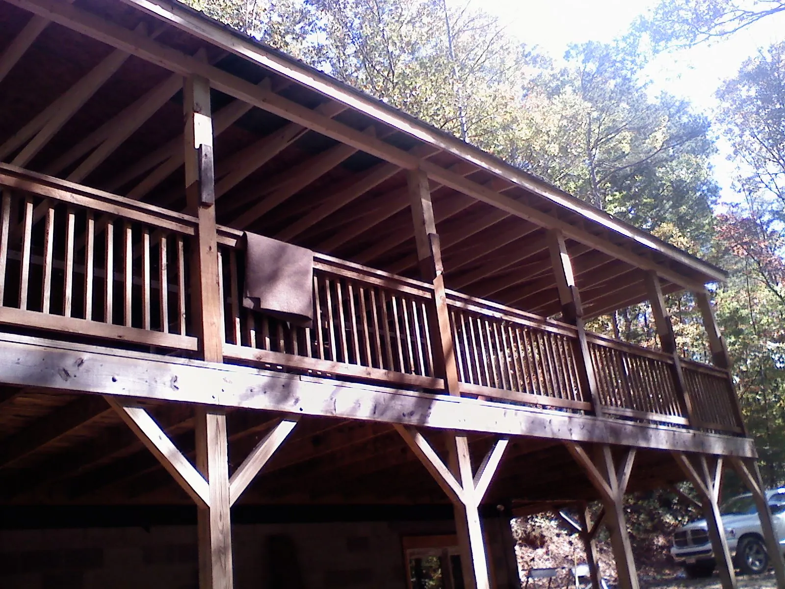 Timber framing under a new elevated porch and deck — Roof Leak Repair in Moses Lake by Roofing Brothers